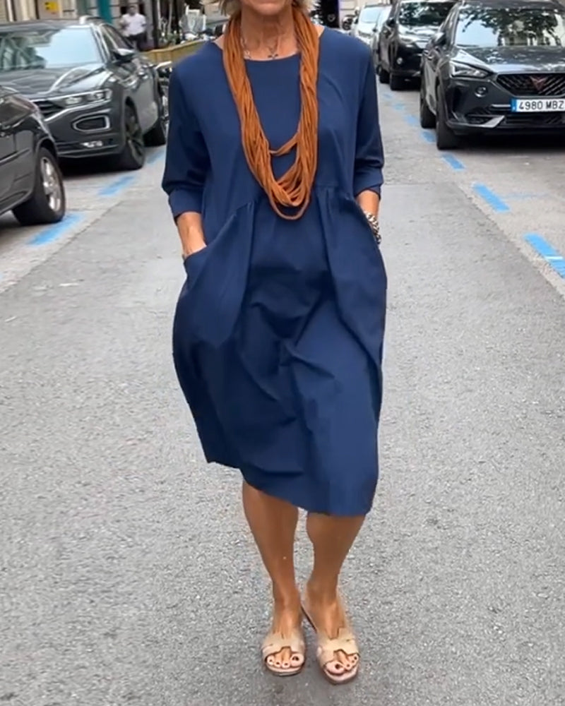 Round neck dress with pockets