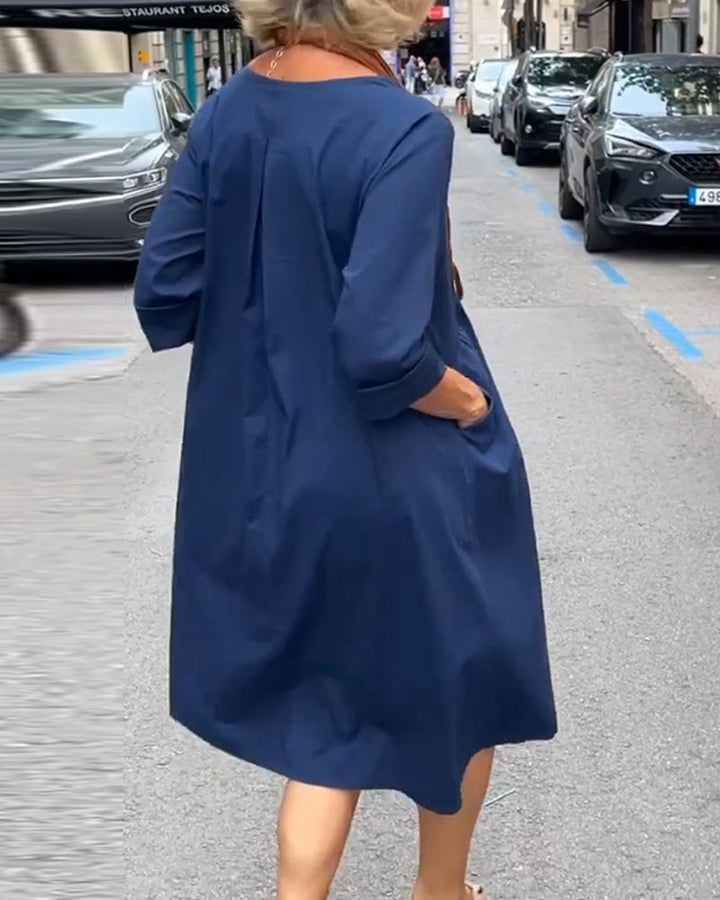 Round neck dress with pockets