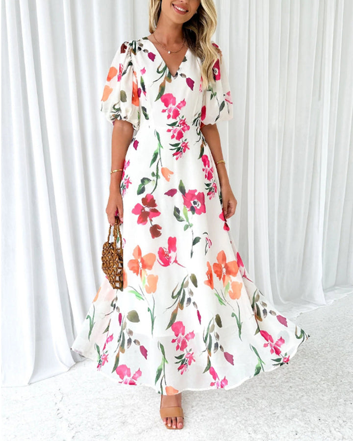 Elegant dress with puff sleeves and floral print